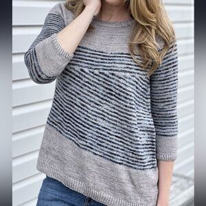 Asymmetrical striped hand knit sweater
